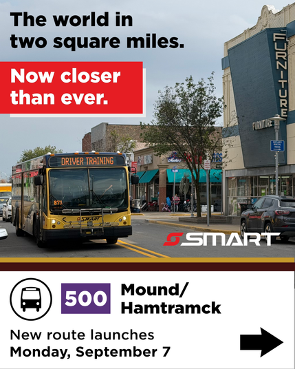 A training bus driving north on Jos Campau toward Caniff in Hamtramck. Text reads "The world in two square miles, now closer than ever. Route 500 Mound/Hamtramck launches Monday, September 7."
